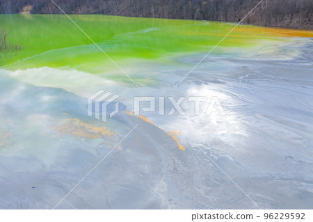 Aerial view of chemical residuals flooding a lake from a copper mine exploitation Aerial view of chemical residuals flooding a lake from a copper mine exploitation 96229592