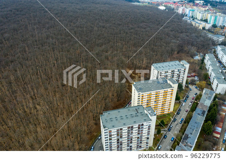 Drone view of urban environment, city taking place of nature Drone view of urban environment, city taking place of nature 96229775