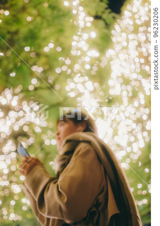 A picture of a woman waiting while listening to music on Christmas Day 96230206