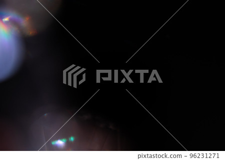 colorful rainbow crystal light leaks on black background 96231271