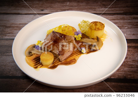 Recipe for veal, potato confit, mushroom, carrot puree, balsamic vinegar sauce, honey and veal stock Recipe for veal, potato confit, mushroom, carrot puree, balsamic vinegar sauce, honey and veal stock 96233046