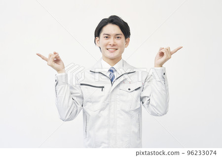 Workers pointing to both sides White background 96233074