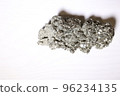 Pyrite crystal, or iron pyrite, on isolated white background, esoteric ore used to purify the energies of environments 96234135