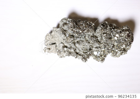 Pyrite crystal, or iron pyrite, on isolated white background, esoteric ore used to purify the energies of environments Pyrite crystal, or iron pyrite, on isolated white background, esoteric ore used to purify the energies of environments 96234135