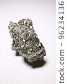 Pyrite crystal, or iron pyrite, on isolated white background, esoteric ore used to purify the energies of environments 96234136