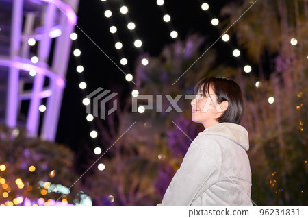 A woman enjoying winter illuminations A woman enjoying winter illuminations 96234831