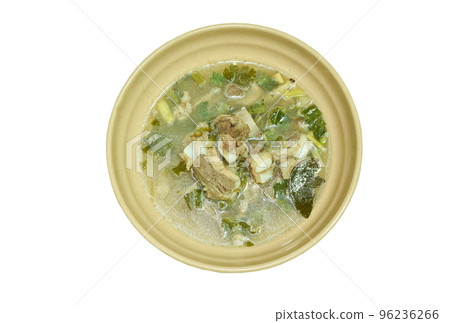 hot and spicy pork bone with tamarind and Thai herbs soup on bowl   96236266