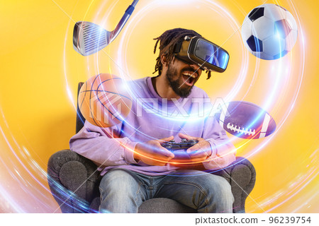 Man with VR glasses play with a virtual videogame Man with VR glasses play with a virtual videogame 96239754