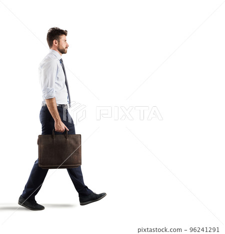 Businessman walks on white background 96241291