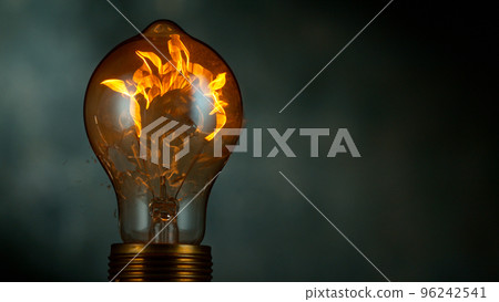 Freeze motion of light bulb exploding, dark background 96242541