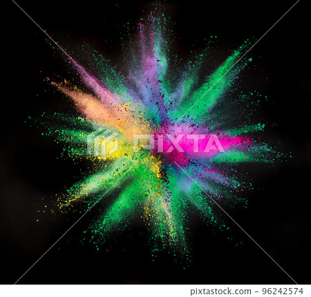 Freeze motion shot of color powder explosion isolated on black background 96242574