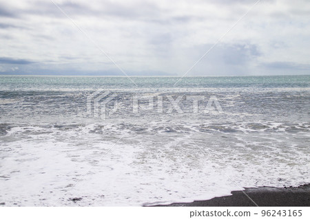 Waves crashing on the shore and sky scenery Waves crashing on the shore and sky scenery 96243165