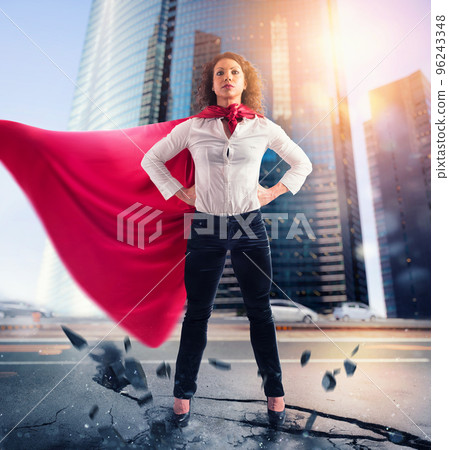 Businesswoman acts like a super hero. Concept of success and determination Businesswoman acts like a super hero. Concept of success and determination 96243348