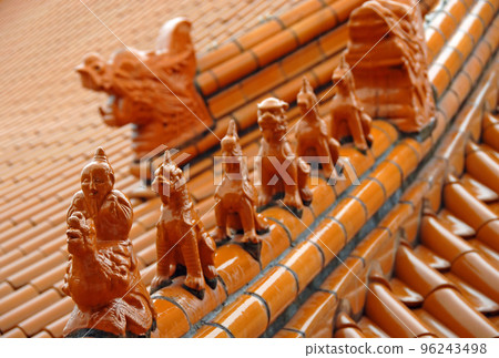 Decorative finials in the form of mythical beasts on a roof at the Fo Guang Shan Nan Tien Temple, a Buddhist temple at Berkeley near Wollongong, Australia. 96243498