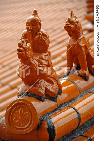 Decorative finials in the form of mythical beasts on a roof at the Fo Guang Shan Nan Tien Temple, a Buddhist temple at Berkeley near Wollongong, Australia. Decorative finials in the form of mythical beasts on a roof at the Fo Guang Shan Nan Tien Temple, a Buddhist temple at Berkeley near Wollongong, Australia. 96243499