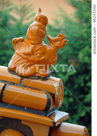 Decorative finial on a roof at the Fo Guang Shan Nan Tien Temple, a Buddhist temple at Berkeley near Wollongong, Australia. 96243500