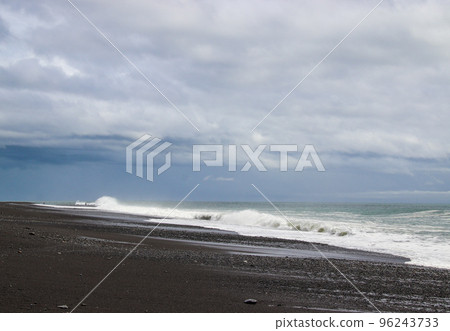 Waves crashing on the shore and sky scenery Waves crashing on the shore and sky scenery 96243733