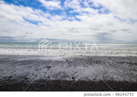 Waves crashing on the shore and sky scenery Waves crashing on the shore and sky scenery 96243735