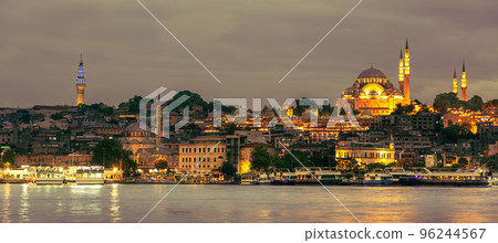 Suleymaniye Mosque with night illumination and minaret of Rustem Pasha Mosque, Istanbul, Turkey 96244567
