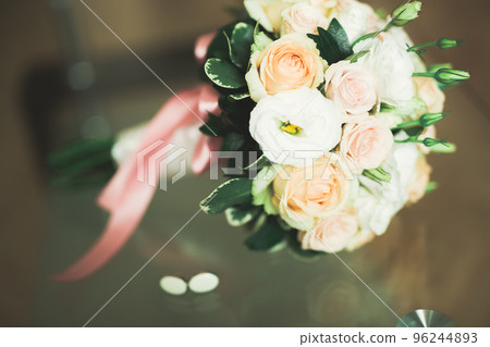 Beautiful wedding bouquet with different flowers, roses Beautiful wedding bouquet with different flowers, roses 96244893
