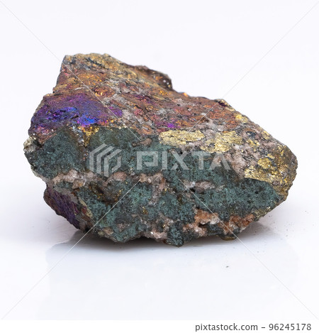 Natural stone chalcopyrite on a white background. Mineral of golden color on a white background 96245178