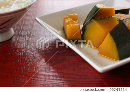 Boiled pumpkin on a white plate Boiled pumpkin on a white plate 96245214
