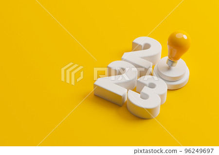 Light bulb and 2023 new year on yellow background 96249697