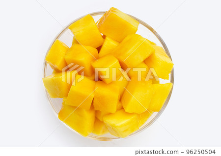Tropical fruit, Mango cube slices in white bowl on white background. Copy space Tropical fruit, Mango cube slices in white bowl on white background. Copy space 96250504