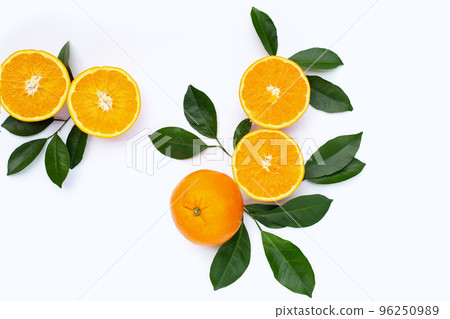 Orange fruit with green leaves on white background. Orange fruit with green leaves on white background. 96250989