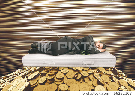 Business man sleeps with money under the mattress to avoid the risk of investing in the financial market Business man sleeps with money under the mattress to avoid the risk of investing in the financial market 96251108