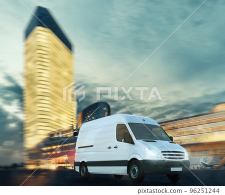 Super fast delivery of package service with a moving van on modern cityscape Super fast delivery of package service with a moving van on modern cityscape 96251244