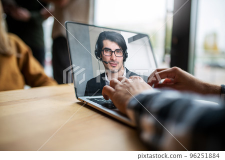 Businessman is working in remote with a videocall due to quarantine of coronavirus covid19. Concept of smart working 96251884