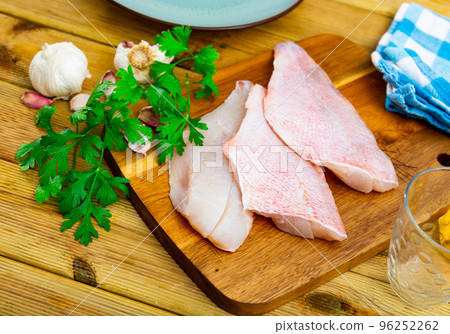 Fresh raw fillet of sea bass 96252262