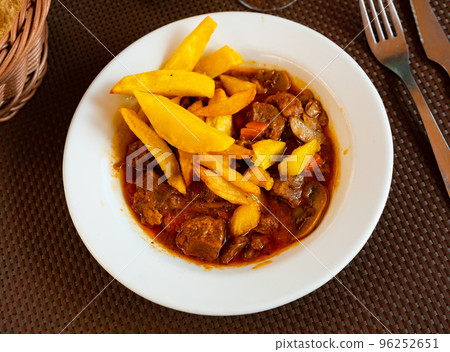 Traditional dish of French cuisine is Beef bourguignon Traditional dish of French cuisine is Beef bourguignon 96252651