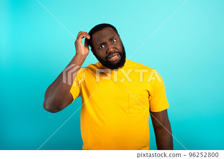Confused Man have to choose something. Concept of options, confusion, decision. Confused Man have to choose something. Concept of options, confusion, decision. 96252800