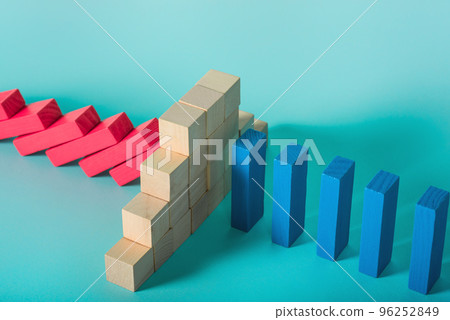 Concept of covid19 coronavirus pandemic with falling chain like a domino game. Contagion and infection progression stopped by a wall of brick. Cyan background 96252849
