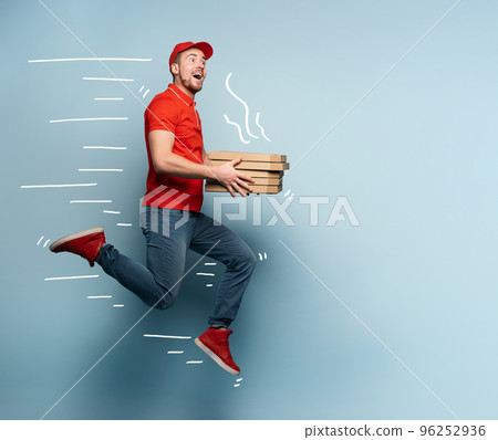 Courier runs fast to deliver quickly pizzas. Cyan background Courier runs fast to deliver quickly pizzas. Cyan background 96252936