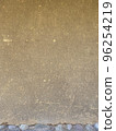 old earthen wall with straw and stone texture 96254219