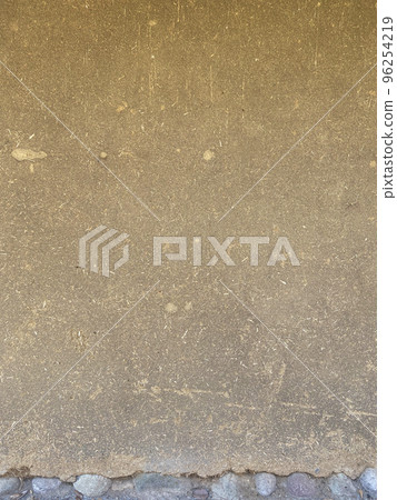 old earthen wall with straw and stone texture old earthen wall with straw and stone texture 96254219