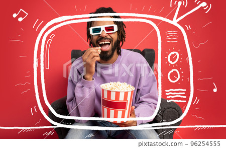 Boy has fun watching a film. Concept of entertainment and streaming tv 96254555