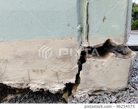 Closeup Cracked concrete building or pillar cement wall broken at the outside effect with earthquake 96254573