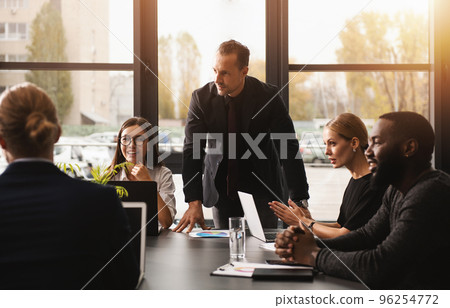 Business people that work together in office. Concept of teamwork and partnership 96254772