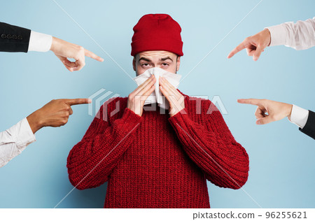 Boy caught a cold is accused of infecting the virus. Studio on Cyan background Boy caught a cold is accused of infecting the virus. Studio on Cyan background 96255621