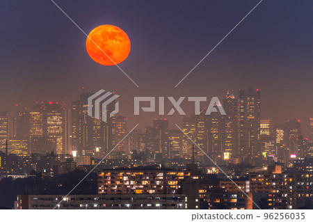 "Tokyo" Looking at the Tokyo city night view of the full moon and the skyscrapers in the Shinjuku sub-center 96256035