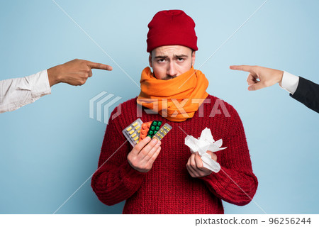 Boy caught a cold is accused of infecting the virus. Studio on Cyan background Boy caught a cold is accused of infecting the virus. Studio on Cyan background 96256244