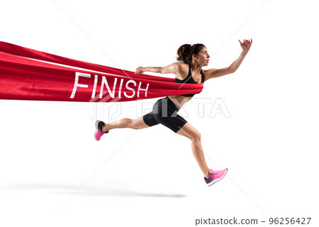 Winner woman runner on the finish line 96256427