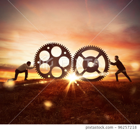 Cooperation at work concept with gears mechanism 96257218