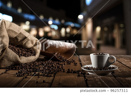 Background of cup of coffee beans Background of cup of coffee beans 96257311