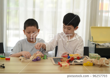 Children playing with wooden toys, toys, education, white background, wooden concept. 96257703