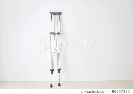 Crutches in an unmanned room with copy space 96257803